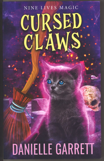 Cursed Claws (A Nine Lives Magic Mystery, Book 3)